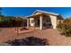 Covered patio with fire pit and built-in grill at 1151 E Stardust Way, San Tan Valley, AZ 85143