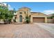 Two-story house with a brick driveway and landscaping at 1188 W Laredo Ave, Gilbert, AZ 85233