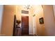 Inviting entryway with high ceilings and decorative lighting at 14335 W Monte Vista Rd, Goodyear, AZ 85395