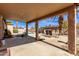 Covered patio overlooking a sparkling pool and seating area at 14409 N 34Th Way, Phoenix, AZ 85032