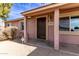 Dark brown front door with decorative accents at 14409 N 34Th Way, Phoenix, AZ 85032