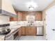 Kitchen features stainless steel appliances and ample cabinet space at 14409 N 34Th Way, Phoenix, AZ 85032