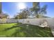 Landscaped backyard with grassy lawn and seating area at 15034 N 30Th St, Phoenix, AZ 85032