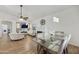 Bright dining area with glass table and upholstered chairs at 15034 N 30Th St, Phoenix, AZ 85032