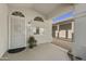 Front entry with a security door and decorative planters at 15034 N 30Th St, Phoenix, AZ 85032