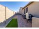 Walled backyard with rock landscaping and low maintenance desert plants at 15804 N 109Th Dr, Sun City, AZ 85351