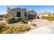 Charming single-story home with well-maintained desert landscaping and a brick driveway at 15804 N 109Th Dr, Sun City, AZ 85351