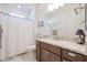 Elegant bathroom with granite countertop and walk-in shower at 16247 S 180Th Dr, Goodyear, AZ 85338