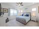 Relaxing bedroom with plush bed, large window, and plenty of natural light at 16247 S 180Th Dr, Goodyear, AZ 85338