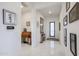 Bright entryway with tile flooring and decorative accents at 16247 S 180Th Dr, Goodyear, AZ 85338