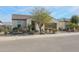 Single-story home with a two-car garage and desert landscaping at 16247 S 180Th Dr, Goodyear, AZ 85338