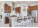 Spacious kitchen with granite countertops and stainless steel appliances at 16247 S 180Th Dr, Goodyear, AZ 85338