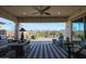 Relaxing covered patio with comfortable seating and view at 16247 S 180Th Dr, Goodyear, AZ 85338