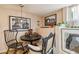 Charming dining area featuring a round table, chairs, and unique decor at 1638 E Earll Dr, Phoenix, AZ 85016