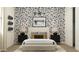 Stylish bedroom with a unique wall design and a bed at 17593 W Victory St, Goodyear, AZ 85338