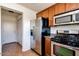 Kitchen with stainless steel appliances and wood cabinets at 1777 S Balboa Dr, Gilbert, AZ 85295