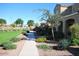 Landscaped side yard with walkway leading to the house entrance at 1777 S Balboa Dr, Gilbert, AZ 85295