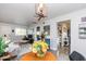 Bright dining area with kitchen and living room views at 180 S Stardust Ln, Apache Junction, AZ 85120