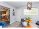 Small dining area with view of kitchen and laundry at 180 S Stardust Ln, Apache Junction, AZ 85120