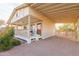 Front view of charming house with covered porch at 180 S Stardust Ln, Apache Junction, AZ 85120