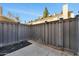 Private backyard with gray wood fence and small patio at 18621 N 34Th Ave # 1, Phoenix, AZ 85027