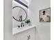 Modern bathroom with white vanity, black matte fixtures, and stylish art at 18621 N 34Th Ave # 1, Phoenix, AZ 85027