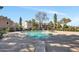 Community swimming pool with lounge chairs and patio at 18621 N 34Th Ave # 1, Phoenix, AZ 85027