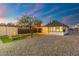 Spacious backyard with pergola, picnic table and string lights at 1921 W Monte Vista Rd, Phoenix, AZ 85009