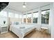 Light and airy bedroom featuring a queen bed and large windows at 1921 W Monte Vista Rd, Phoenix, AZ 85009