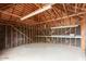 Unfinished garage interior with high ceilings at 1921 W Monte Vista Rd, Phoenix, AZ 85009