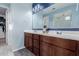 Bathroom features a double sink vanity with ample cabinet space and modern fixtures at 1983 E Sarona Ct, San Tan Valley, AZ 85143