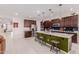 Modern kitchen featuring stainless steel appliances, a large island, and plenty of counter space for cooking at 1983 E Sarona Ct, San Tan Valley, AZ 85143