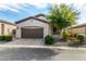 Single story home with 2 car garage and desert landscaping at 2049 N 88Th St, Mesa, AZ 85207