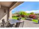 Relaxing patio with table and chairs, perfect for outdoor dining at 2049 N 88Th St, Mesa, AZ 85207