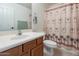 Guest bathroom with single vanity and shower/tub combo at 20767 N Bustos Way, Maricopa, AZ 85138