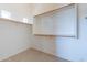 Large walk-in closet with ample shelving at 20767 N Bustos Way, Maricopa, AZ 85138