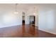 Elegant dining area features hardwood floors and recessed lighting at 20767 N Bustos Way, Maricopa, AZ 85138