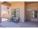 Relaxing front porch with rocking chairs, perfect for enjoying the Arizona weather at 20767 N Bustos Way, Maricopa, AZ 85138