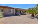 Landscaped backyard with gravel and desert plants at 20876 N Canyon Whisper Dr, Surprise, AZ 85387