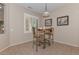 Breakfast nook with table and chairs, adjacent to kitchen at 20876 N Canyon Whisper Dr, Surprise, AZ 85387