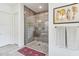 Modern bathroom with glass shower enclosure, stylish tile, and a relaxing atmosphere at 23491 N 125Th Pl, Scottsdale, AZ 85255