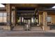 Grand entrance with stone pillars, glass doors, and a modern water feature at the base of the steps at 23491 N 125Th Pl, Scottsdale, AZ 85255