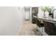 Stylish kitchen bar area featuring granite countertops and barstool seating at 24134 N Cotton Cir, Florence, AZ 85132