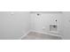 An empty laundry room ready for appliances at 24134 N Cotton Cir, Florence, AZ 85132