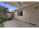 Covered patio area with ceiling fan overlooking desert plants at 2442 N 22Nd Ave, Phoenix, AZ 85009