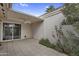 Covered patio area with a ceiling fan overlooking desert vegetation at 2442 N 22Nd Ave, Phoenix, AZ 85009