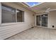 Covered patio area with a ceiling fan and a view of desert foliage at 2442 N 22Nd Ave, Phoenix, AZ 85009