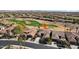 Aerial view of a house and surrounding area, near a golf course at 27379 N Makena Pl, Peoria, AZ 85383