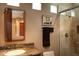 Guest bathroom with shower and granite vanity at 28492 N 95Th Pl, Scottsdale, AZ 85262