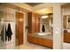 Bathroom with granite vanity and large shower at 28492 N 95Th Pl, Scottsdale, AZ 85262